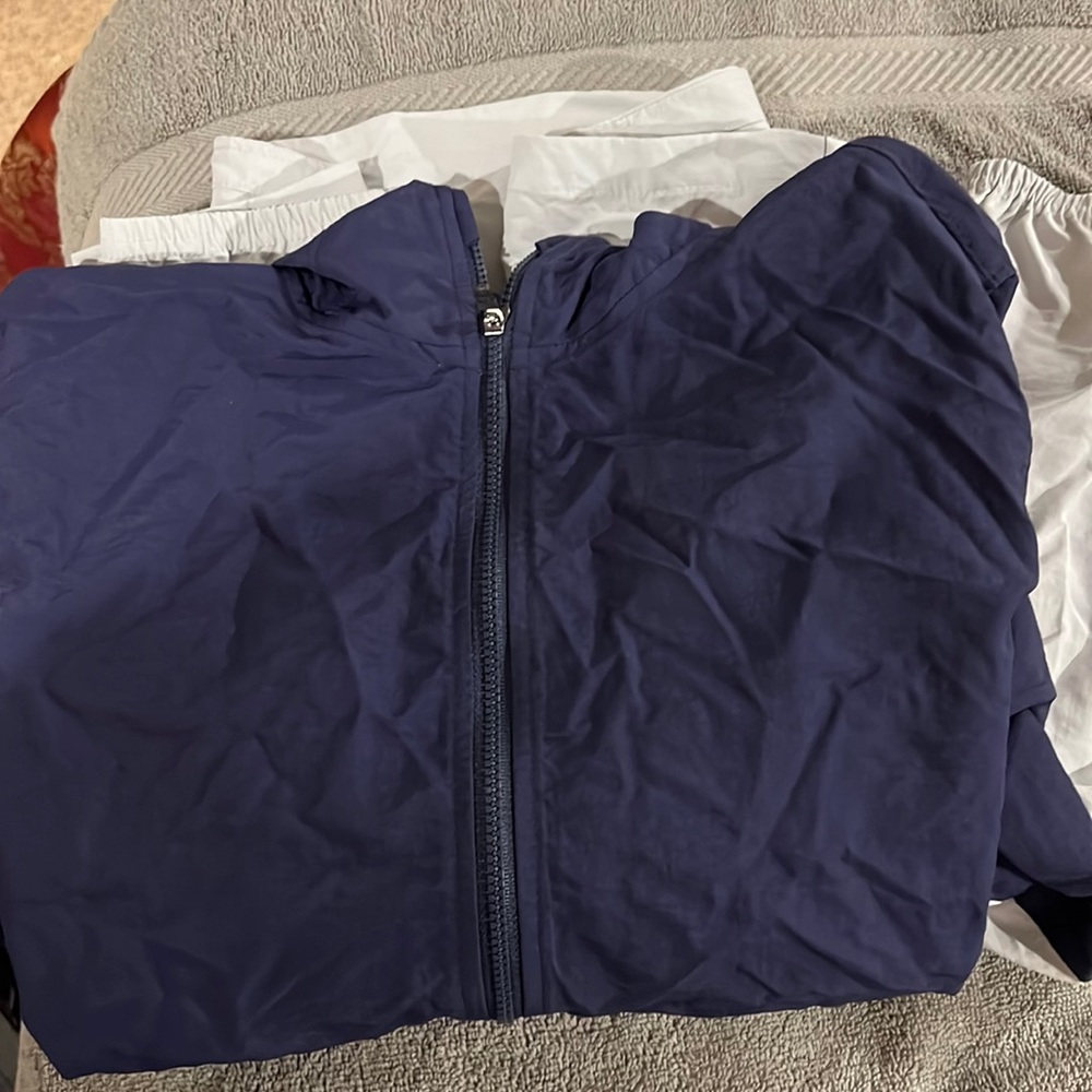 Brand new Old Navy light weight wind/rain jacket boys XL